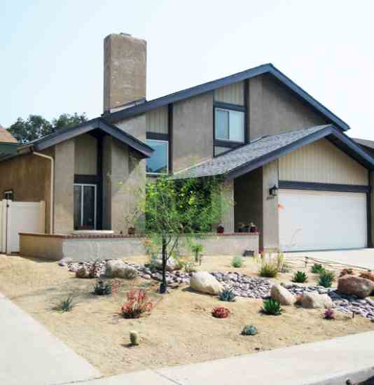 Xeriscaping with efficient irrigation can be attractive while using very little water.